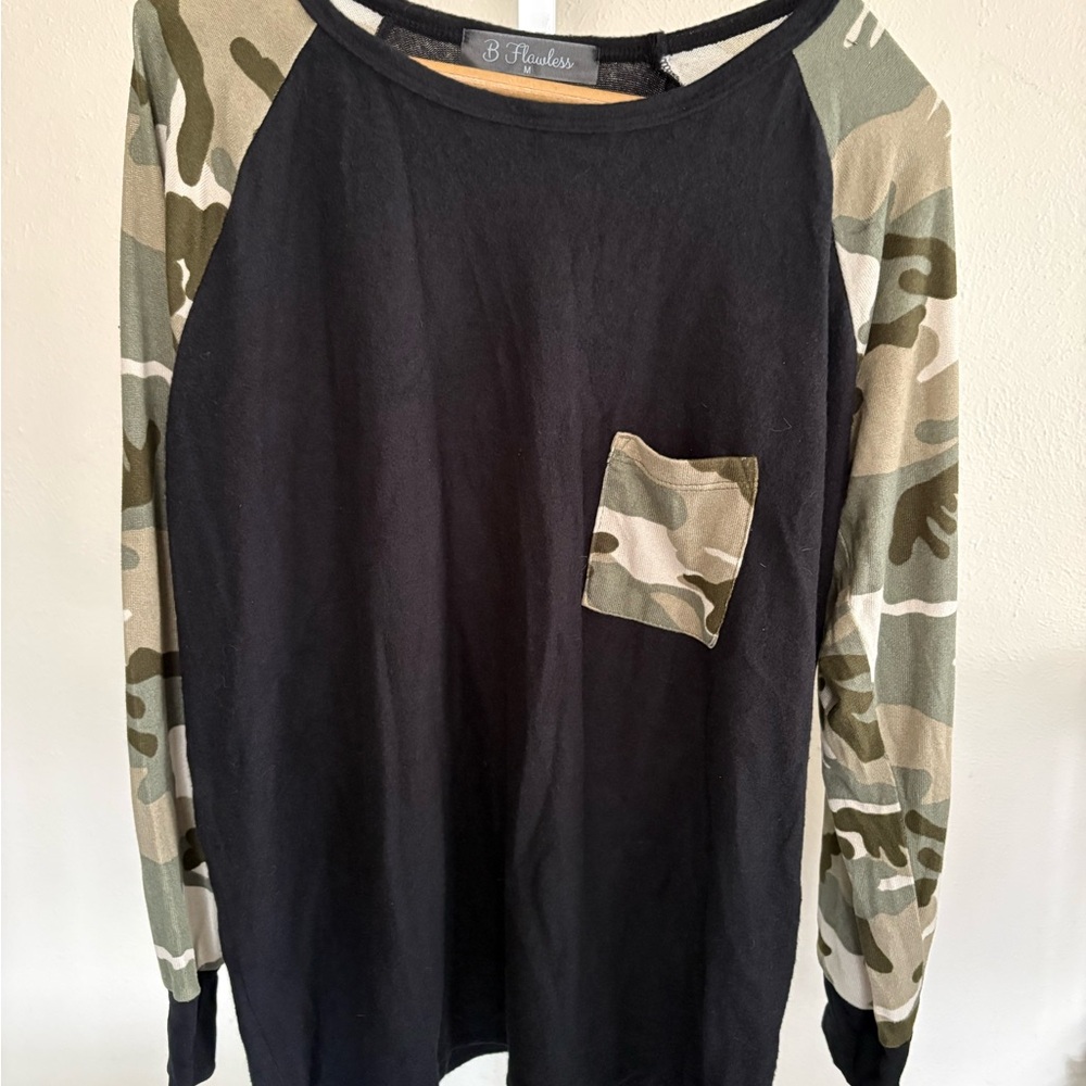 B. Flawless Black Long Sleeve Top Size Medium